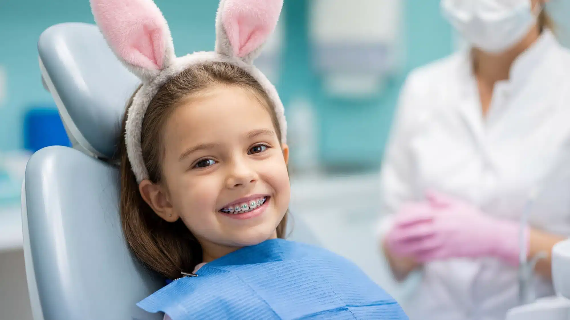 Smiling family at the dentist office together